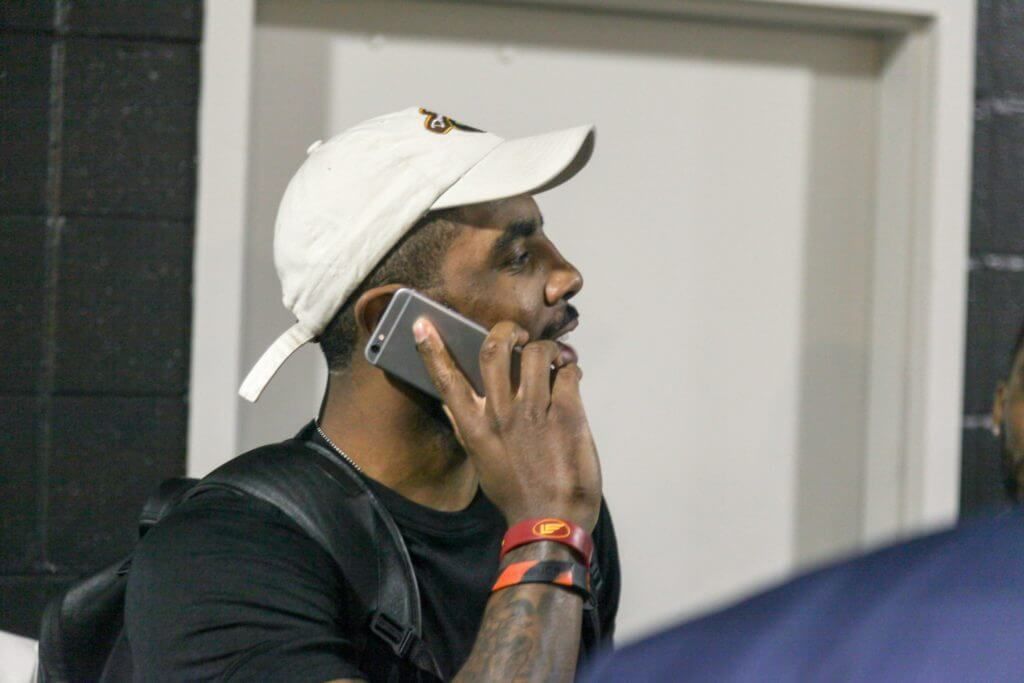 Kyrie Irving on the phone