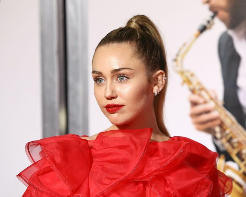 Miley Cyrus at the "Isn't It Romantic" World Premiere at the Theatre at Ace Hotel in 2019